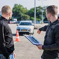 people-looking-at-car